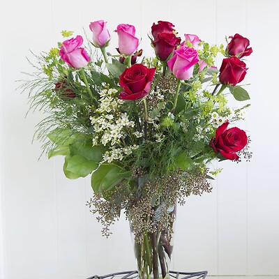 One dozen red and pink long stem roses